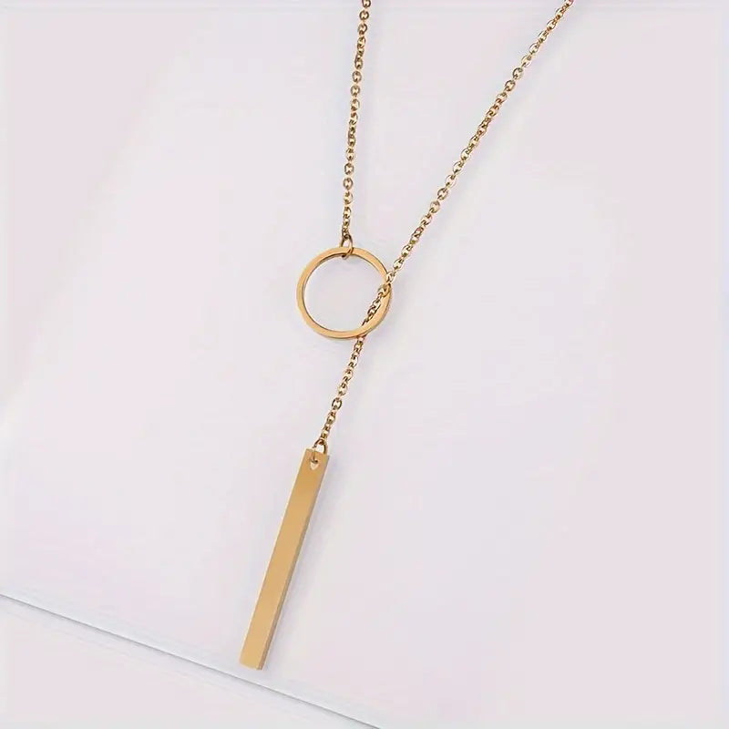 Camila | Ethnic-inspired alloy circle and stick pendant necklace