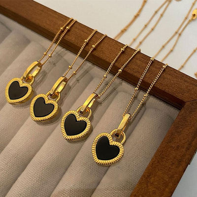 Ofelia | Black and white heart necklace in gold