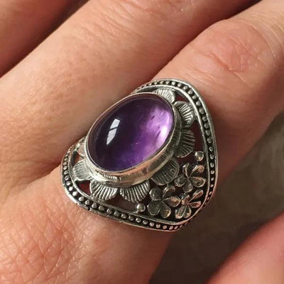 Maricela | Flower ring with purple gemstone