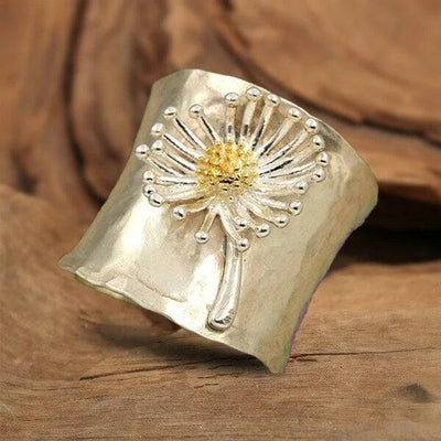 Rebeca | Wide ring with flowering daisies