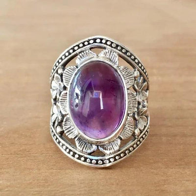 Maricela | Flower ring with purple gemstone