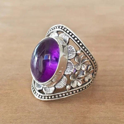 Maricela | Flower ring with purple gemstone