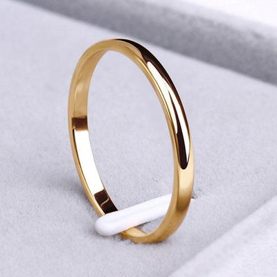 Ximena | Simple gold and silver ring.
