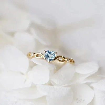 Yasmina | Blue zirconia heart ring in gold