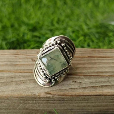 Carmen | Luxury emerald-cut ring