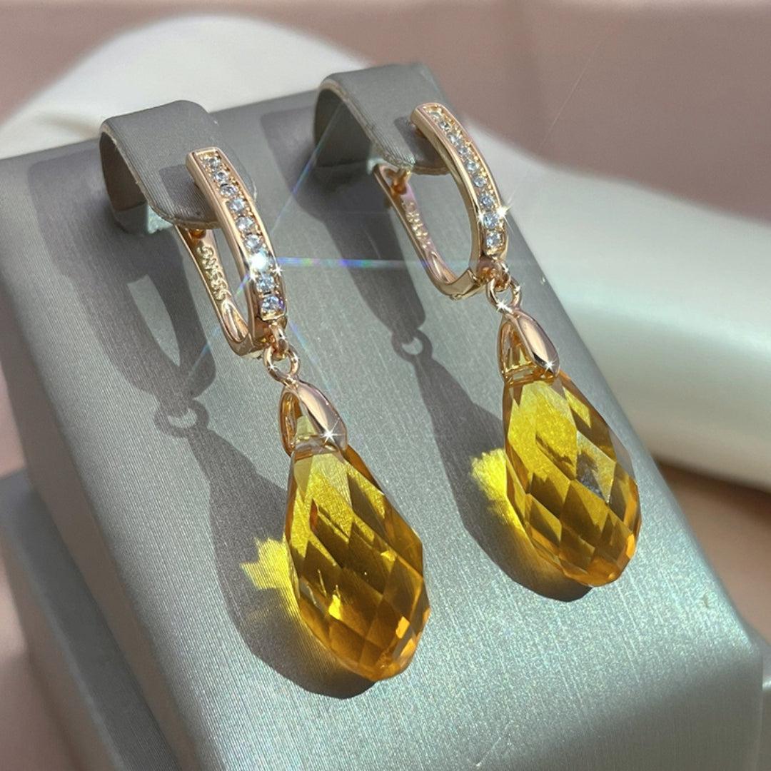 Paula | Yellow crystal dangling earrings in gold