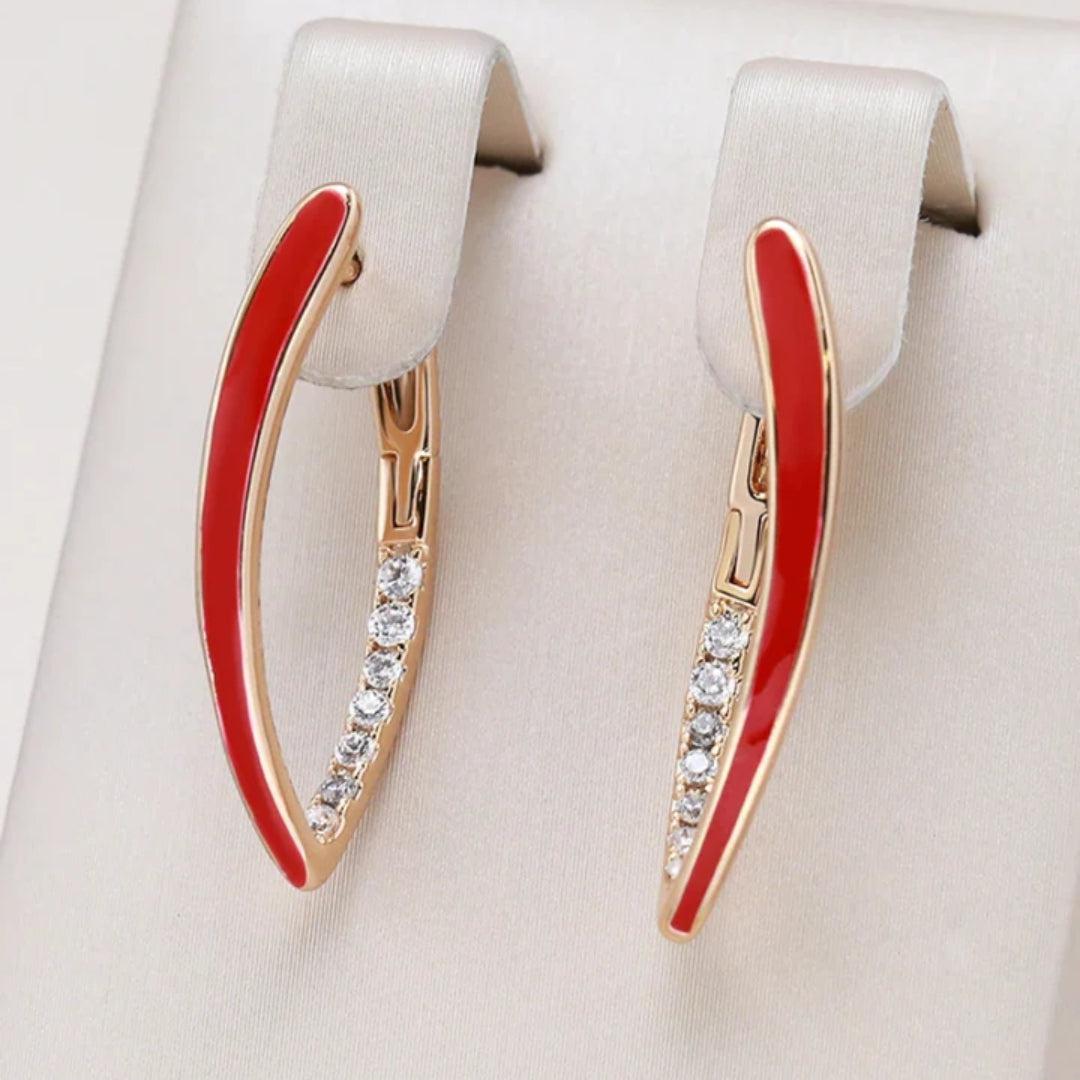 Jacinta | Elegant gold-plated earrings with red enamel.