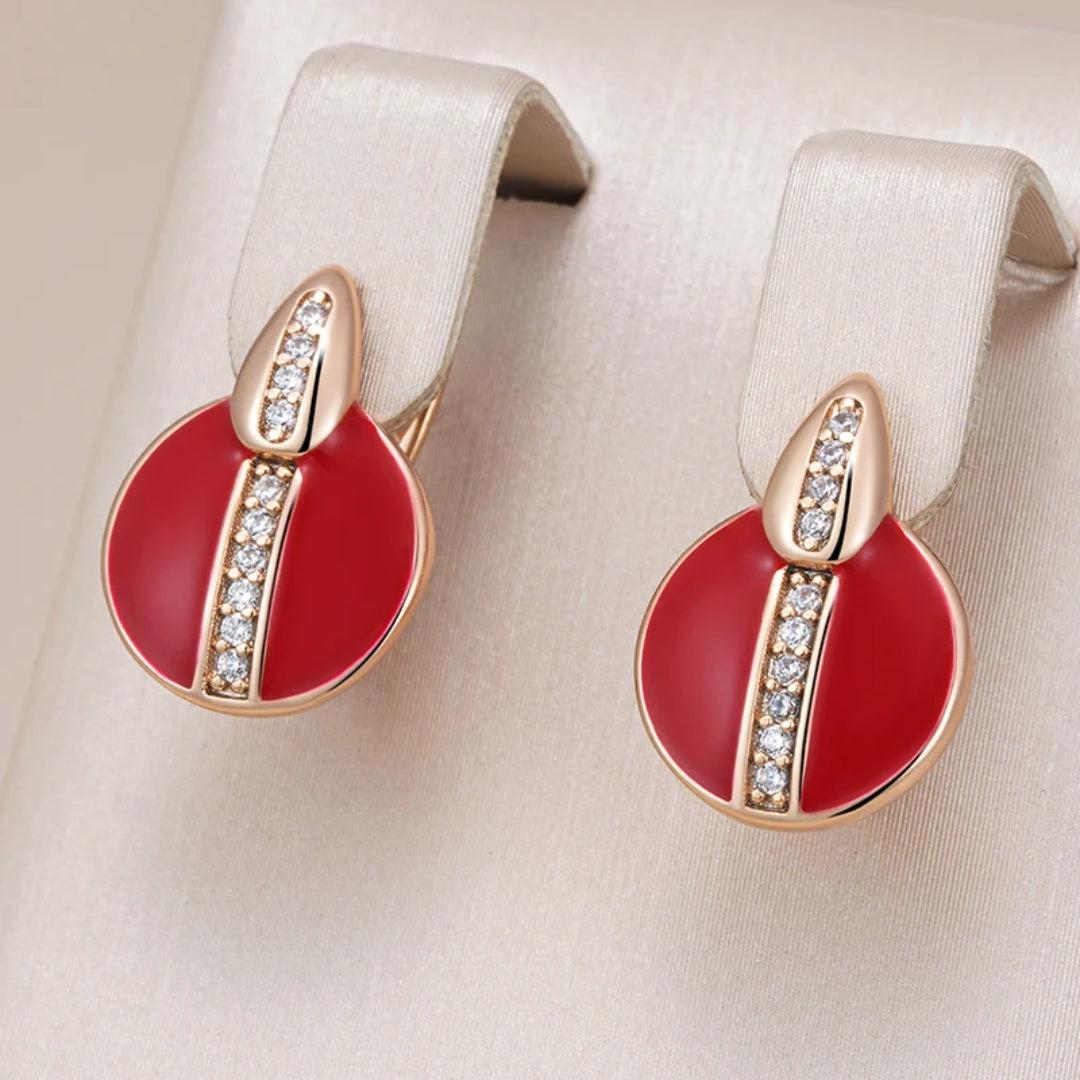 Guillermina | Elegant earrings with red enamel shine.