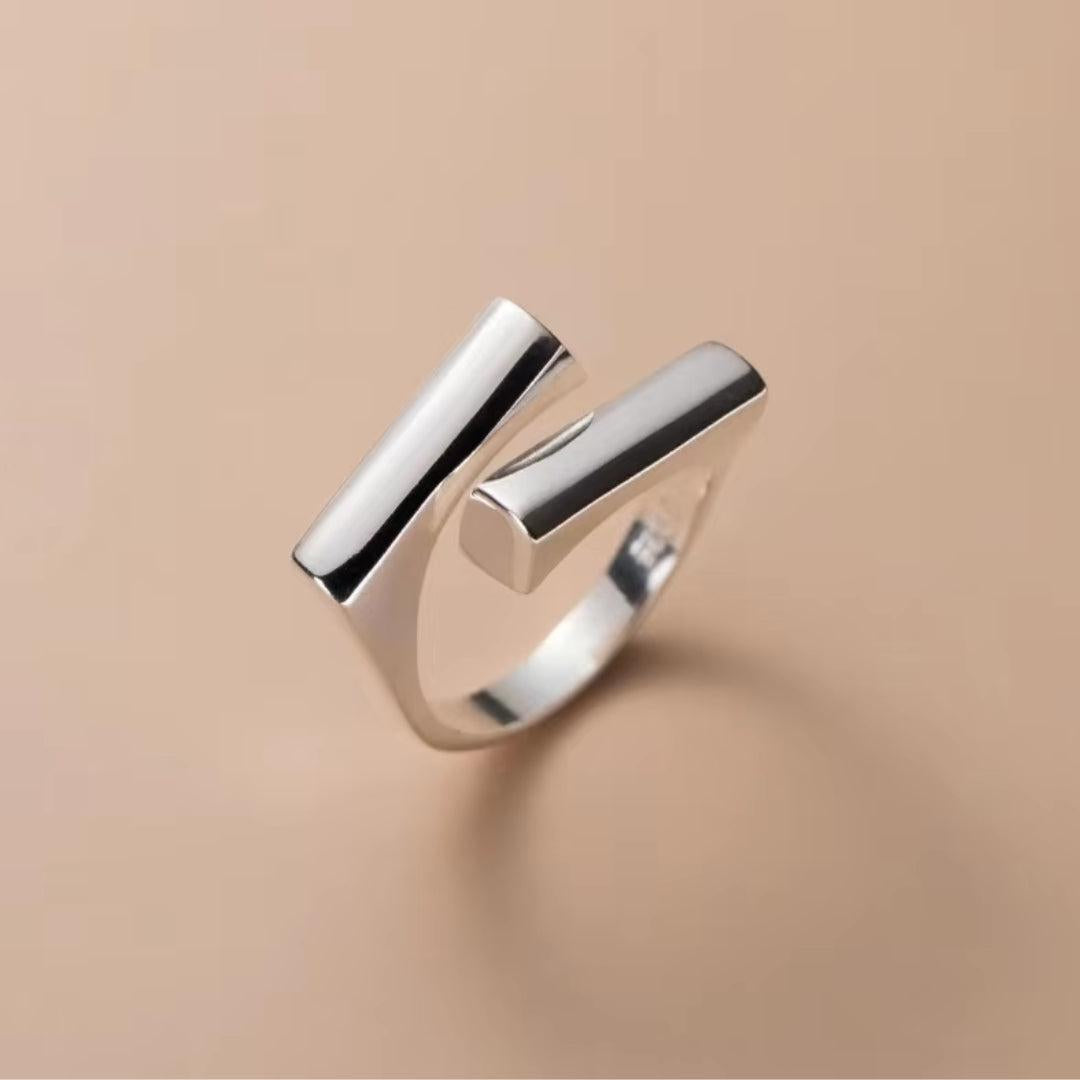 Wendy | Simple geometric ring with soft braids.