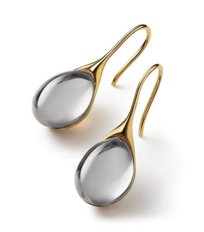 Guadalupe | Crystal dangling earrings in gold and silver.