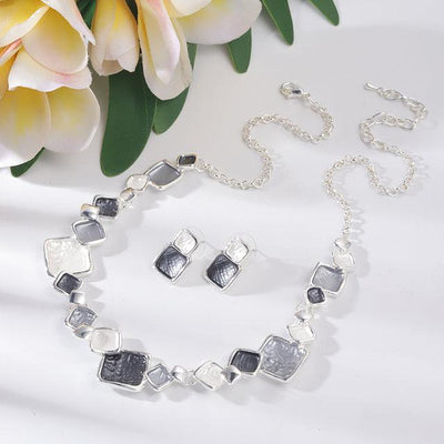 Nayla | Geometric gray enamel round necklaces