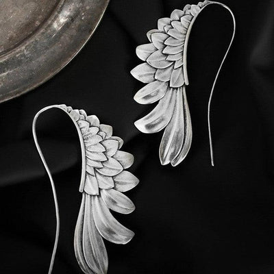 Maricarmen | Vintage winged silver earrings