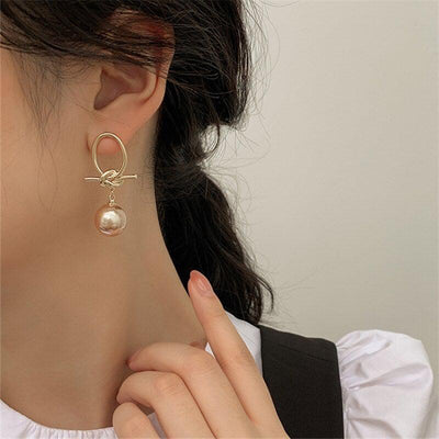 Gabriela | Hoop earrings with golden pearls
