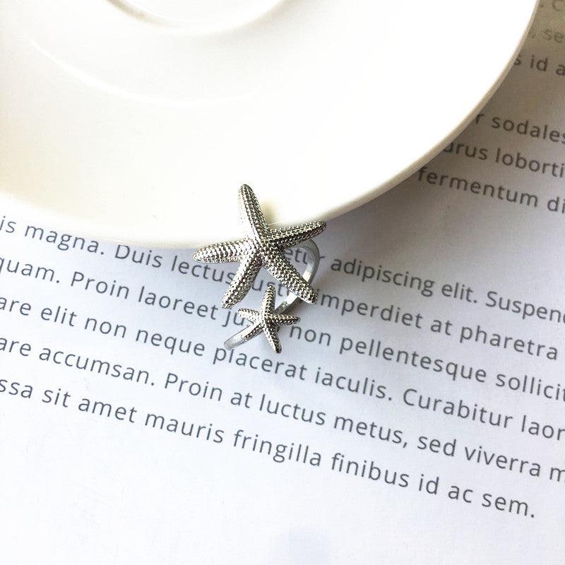 Adriana | Adjustable starfish ring in silver and gold