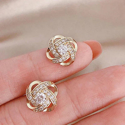 Dayana | Spiral cross earrings with flowers