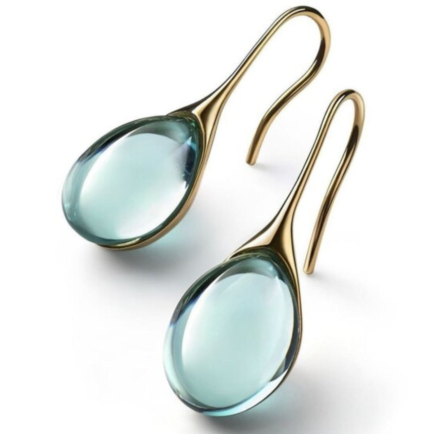 Guadalupe | Crystal dangling earrings in gold and silver.