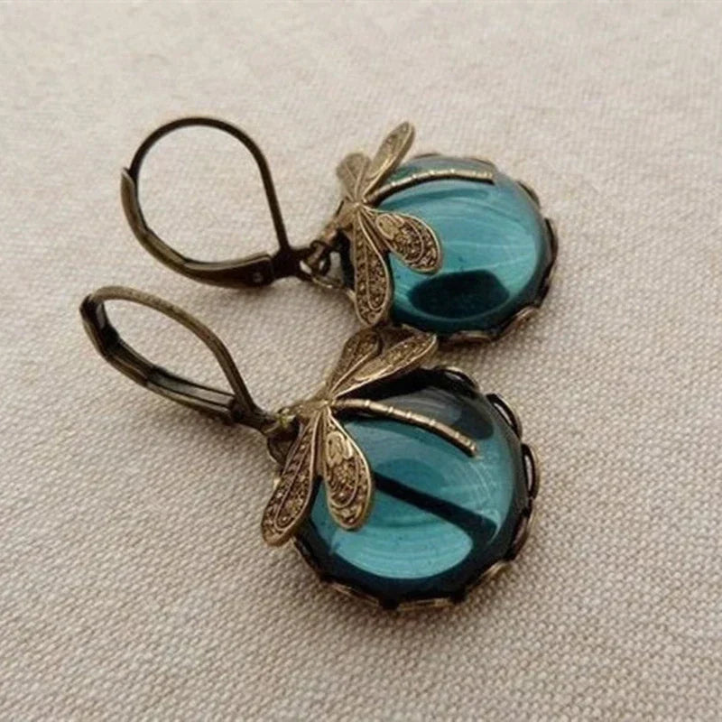 Dolores | Spherical dragonfly earrings in antique gold