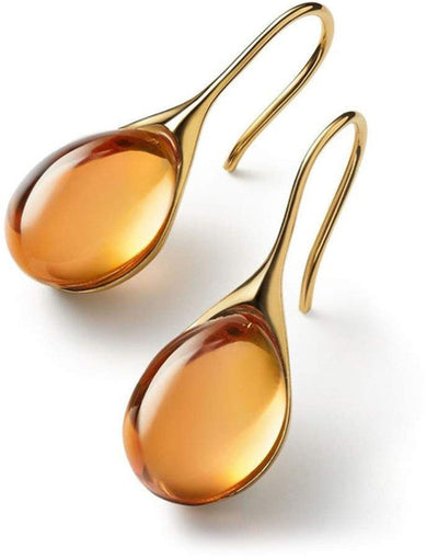 Guadalupe | Crystal dangling earrings in gold and silver.