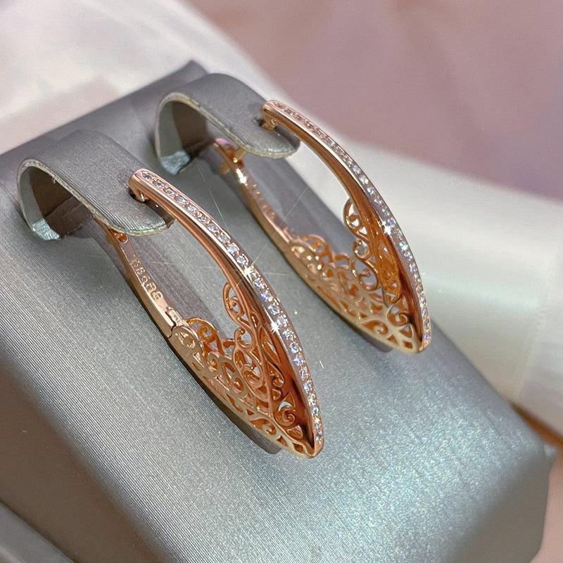 Carmen | Exquisite and elegant shiny gold earrings