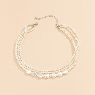 Olga | White stone and pearl necklace in gold
