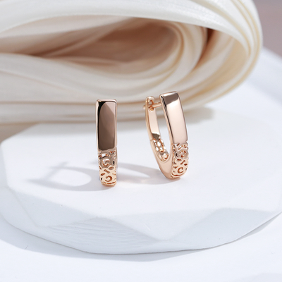 Leire | Elegant golden semi-hoop earrings