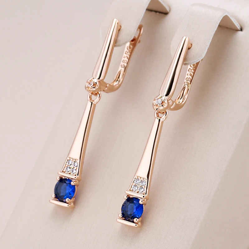Aurora | Blue crystal dangling earrings in gold