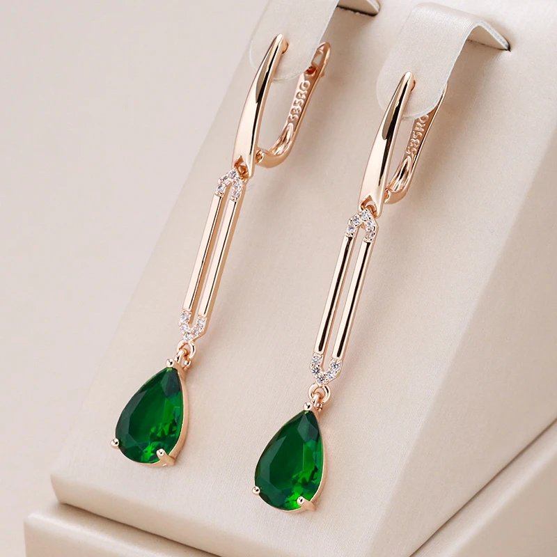 Nora | Green crystal dangling earrings in gold