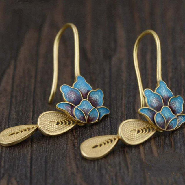Florencia | Bohemian blue lotus earrings in gold