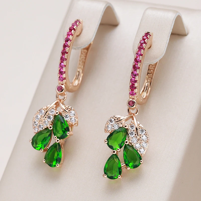 Celeste | Elegant dangling earrings with colored zircons.