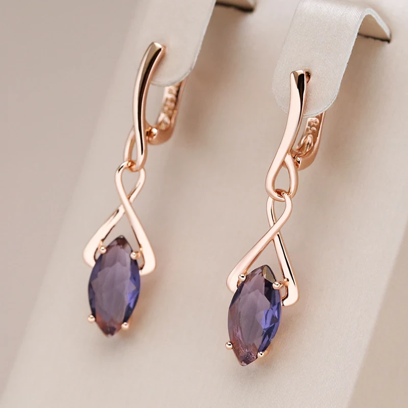 Griselda | Elegant earrings with purple crystal.