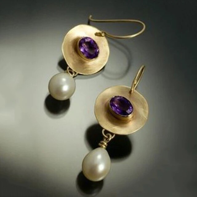 Esperanza | Elegant pearl and purple zircon earrings.