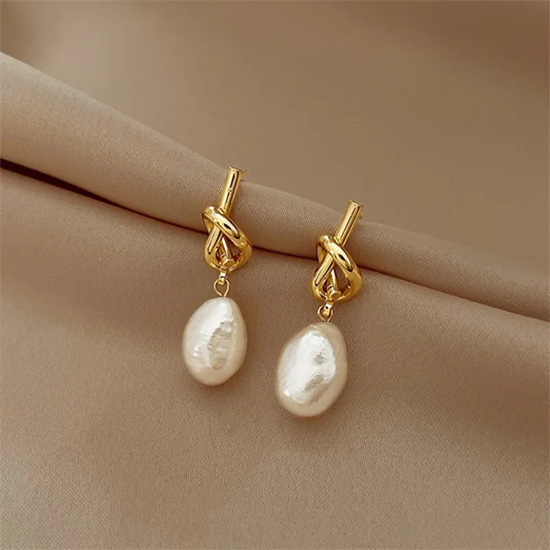 Tatiana | Elegant baroque pearl earrings in gold