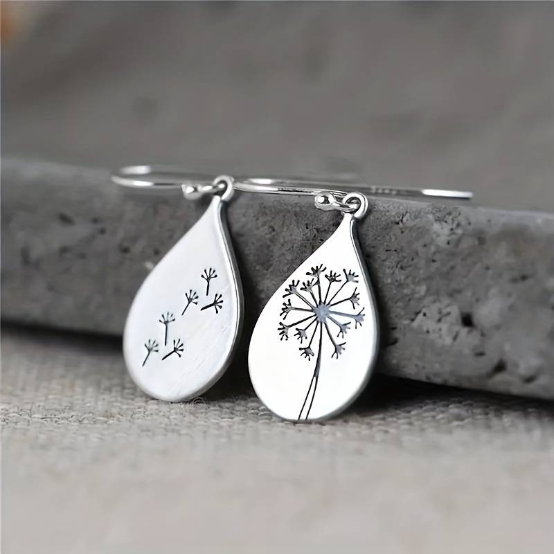 Erika | Vintage silver dandelion dangle earrings