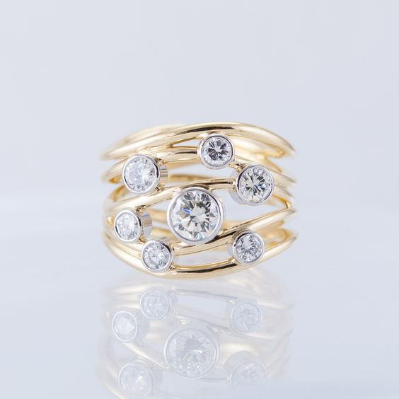 Magaly | Multi-layered gold ring with vintage crystals.