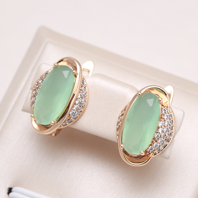 Dominique | Elegant green crystal eye earrings in gold